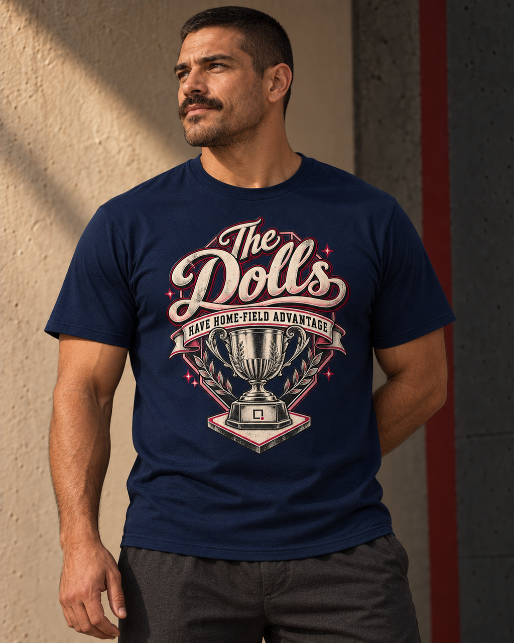 Navy T-shirt featuring The Dolls Home-Field Advantage baseball graphic.